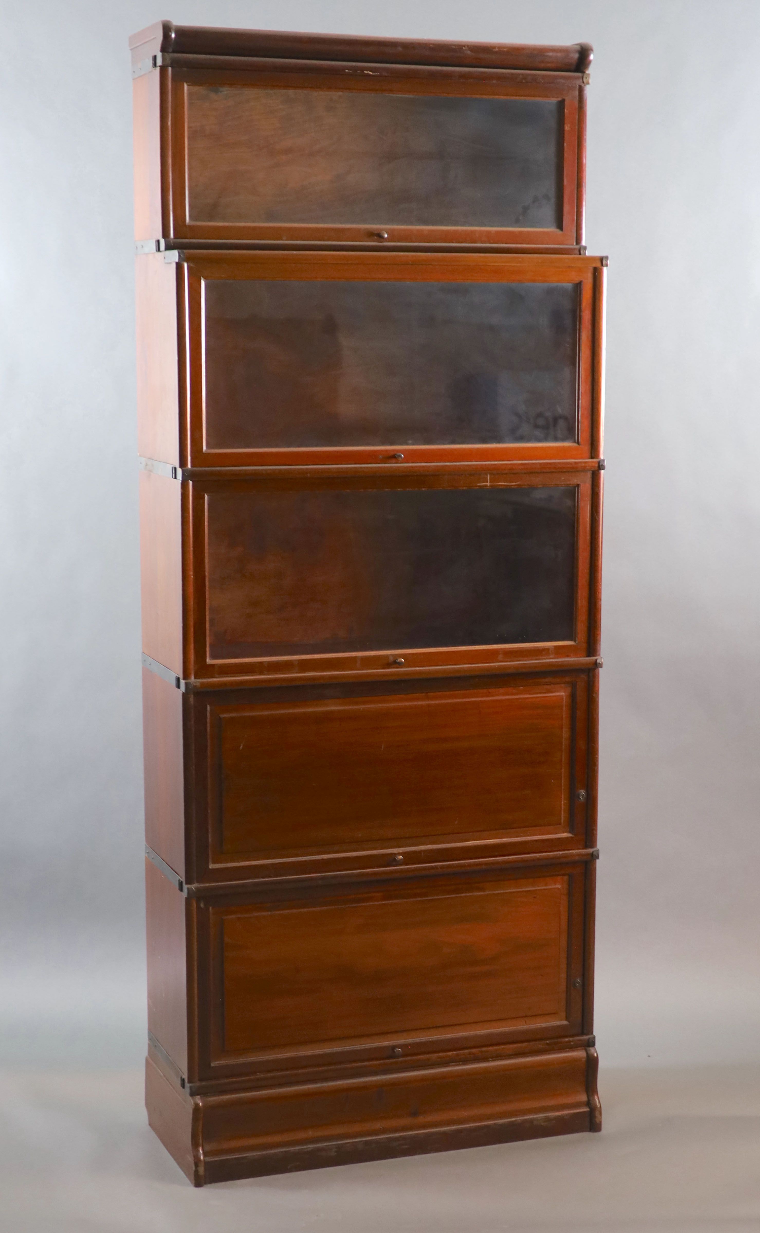 A Globe Wernicke mahogany sectional bookcase, W.87cm D.35.5cm H.220cm.